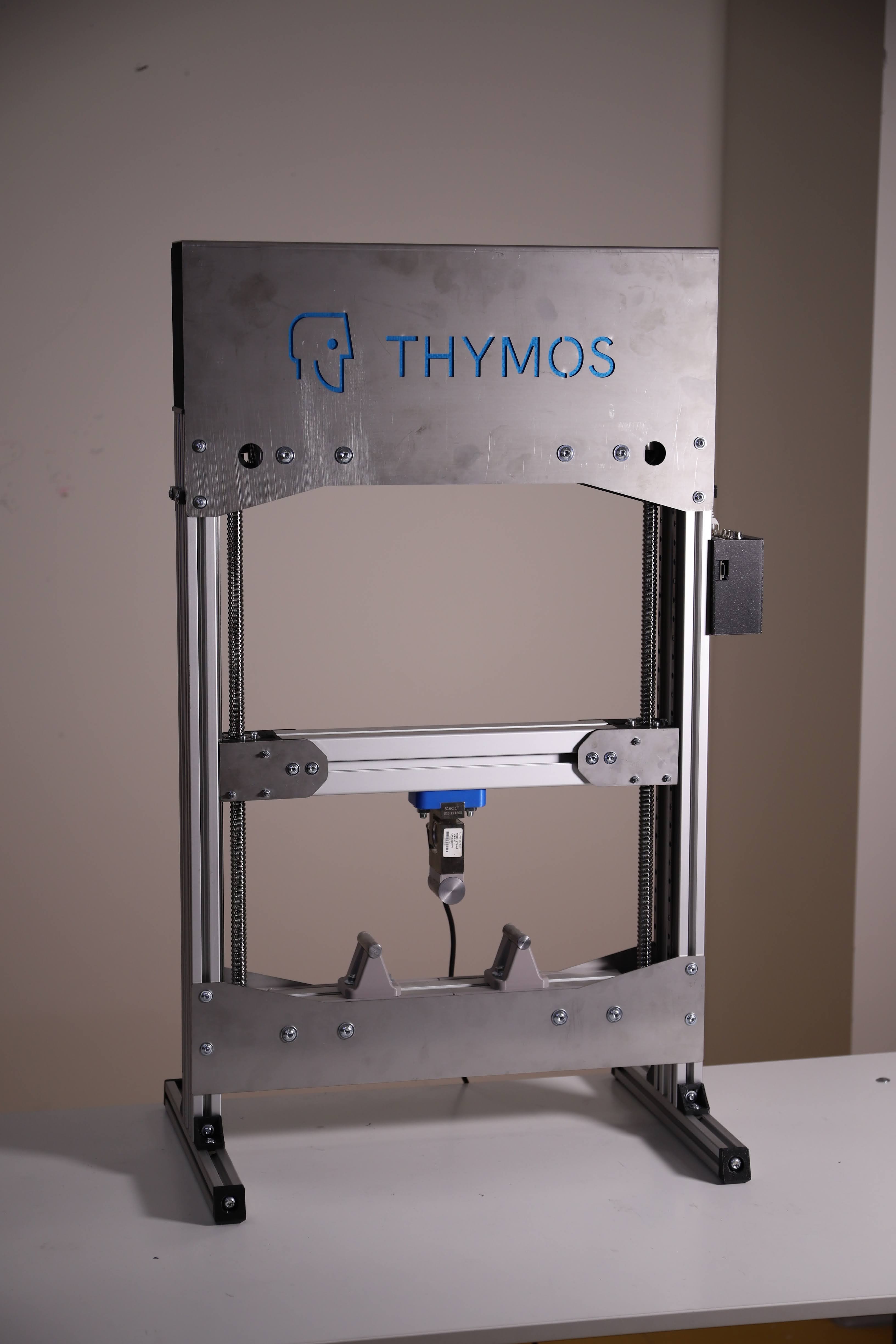 Thymos machine in a vertical laboratory setup